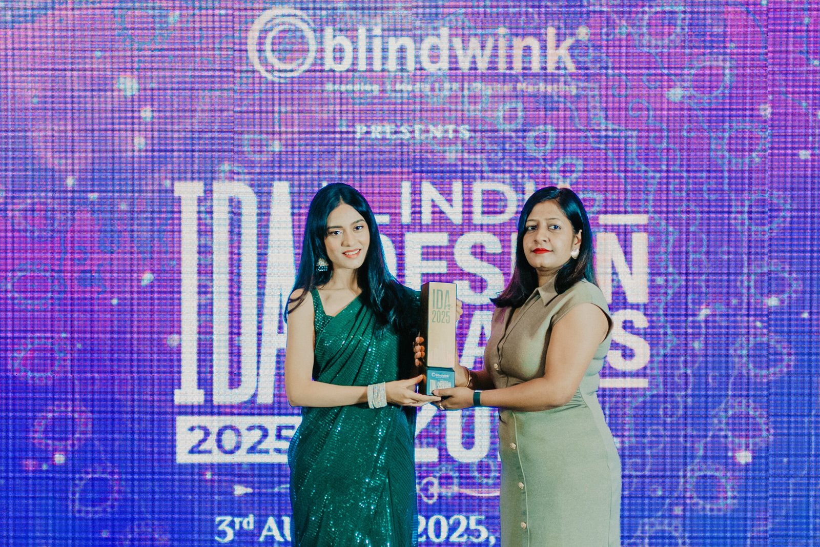 Award presentation photograph supplied by Stylewell Interiors at India Design Awards 2025